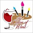 Wine glass with paintbrushes and palette.